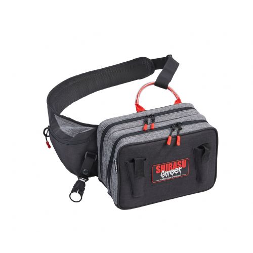 4005652860145 - Shirasu Street skuldertaske, Sling bag - 001 1936 012<br>Shirasu Street Sling Bag/Shoulder Bag: Extremely comfortable shoulder bag with back padding for the active angler. The bag can be opened like a laptop bag. Thanks to the attached tabs, the two compartments remain in a horizontal position. The two boxes are secured with Velcro tape to prevent them from falling out unintentionally. Inside and outside there are additional compartments for accessories and mobile phone. Thanks to the 2 pliers holders you always have pliers and scissors at hand. A special highlight is the integrated rod and bottle holder. In order to have both hands free, the rod is simply latched into the holder. Optionally, you can also attach a bottle. Material PVC.