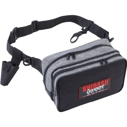 4005652860152 - Shirasu Street bæltetaske, stor - 001 1936 013<br>Shirasu Street Waist Bag: Very comfortable to carry. Similar to our sling bag, the front compartment can also be opened like a laptop bag. Thanks to the attached tabs, the front compartment remains in a horizontal position. The box is secured with Velcro to prevent it from falling out. A tong holder is integrated on the waist belt. 
The Waist Bag also has the rod and bottle holder. In order to have both hands free, the rod is simply latched into the holder. Optionally, you can also attach a bottle. Material: PVC.